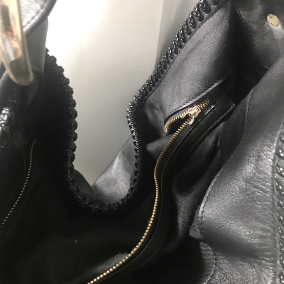 Barely used. Exterior leather is clean.Liner clean - Picture 5 of 7